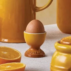 Le Creuset egg cup, Nectar YellowOrange Hot