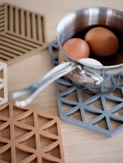 Zone Denmark Triangle trivet, Light Terracotta Red Hot
